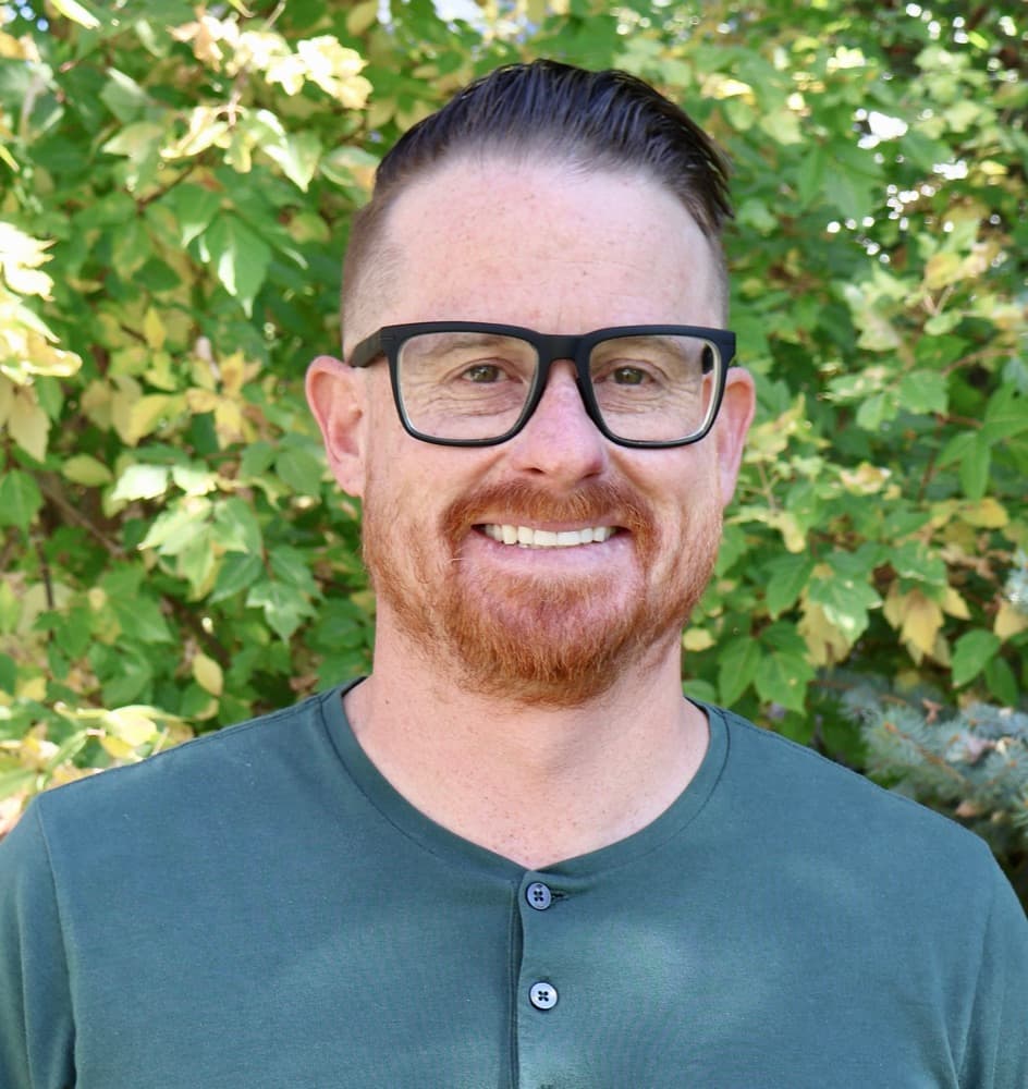 Kevin Barr smiling outdoors